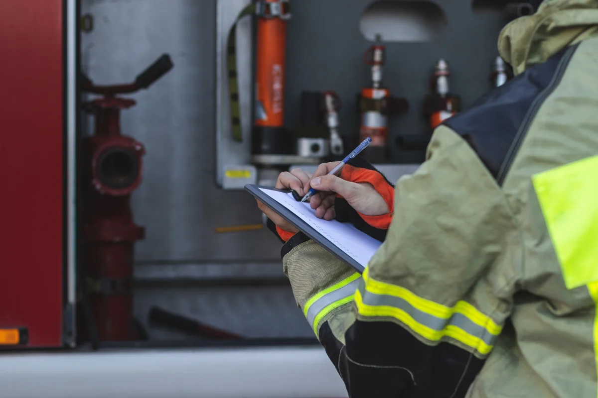 Fire protection technician servicing a commercial system