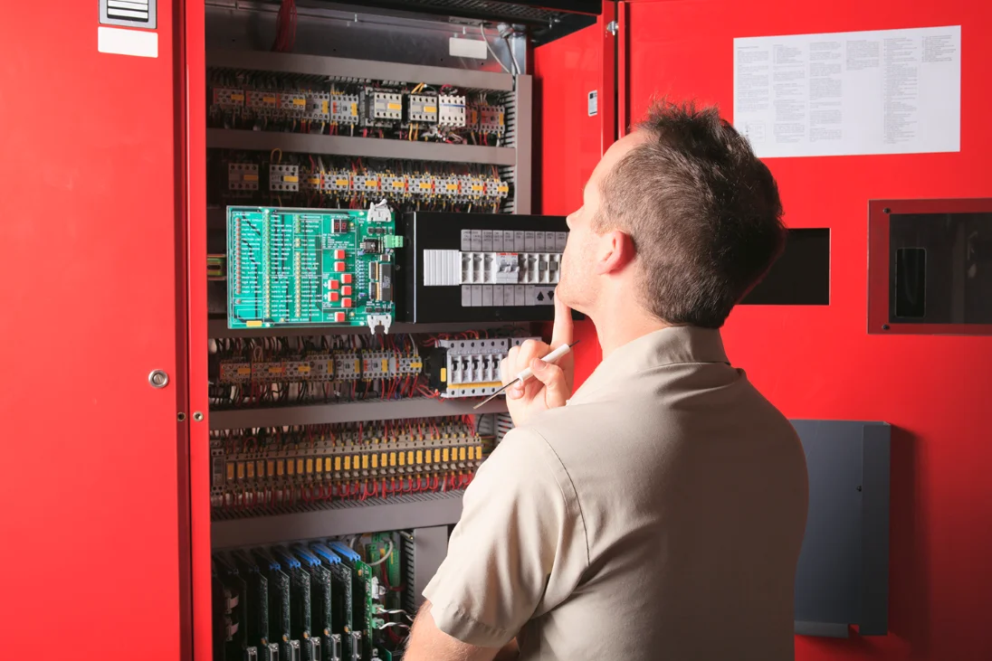 Fire protection technician on site at a commercial building